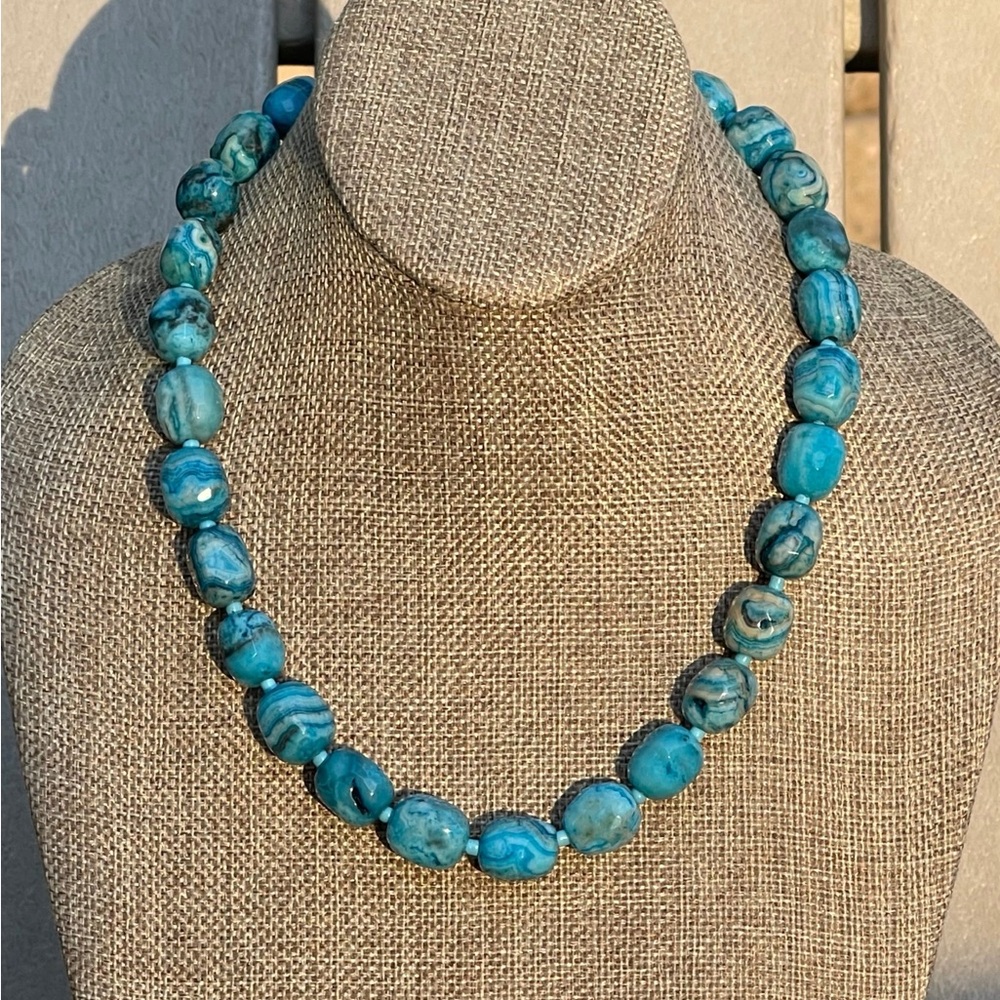 Faceted Crazy Lace Agate beads with a deep gold luxe toggle clasp